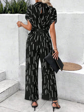 Load image into Gallery viewer, Tied Printed Mock Neck Wide Leg Jumpsuit
