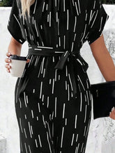 Load image into Gallery viewer, Tied Printed Mock Neck Wide Leg Jumpsuit
