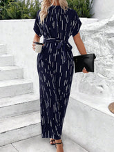 Load image into Gallery viewer, Tied Printed Mock Neck Wide Leg Jumpsuit
