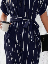 Load image into Gallery viewer, Tied Printed Mock Neck Wide Leg Jumpsuit
